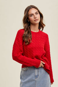 Cherry On Top Cable Knit Sweater: a classic piece designed with a round neckline, drop shoulder and ribbing at the cuffs and hemline. True red casual sweater with cable detail.