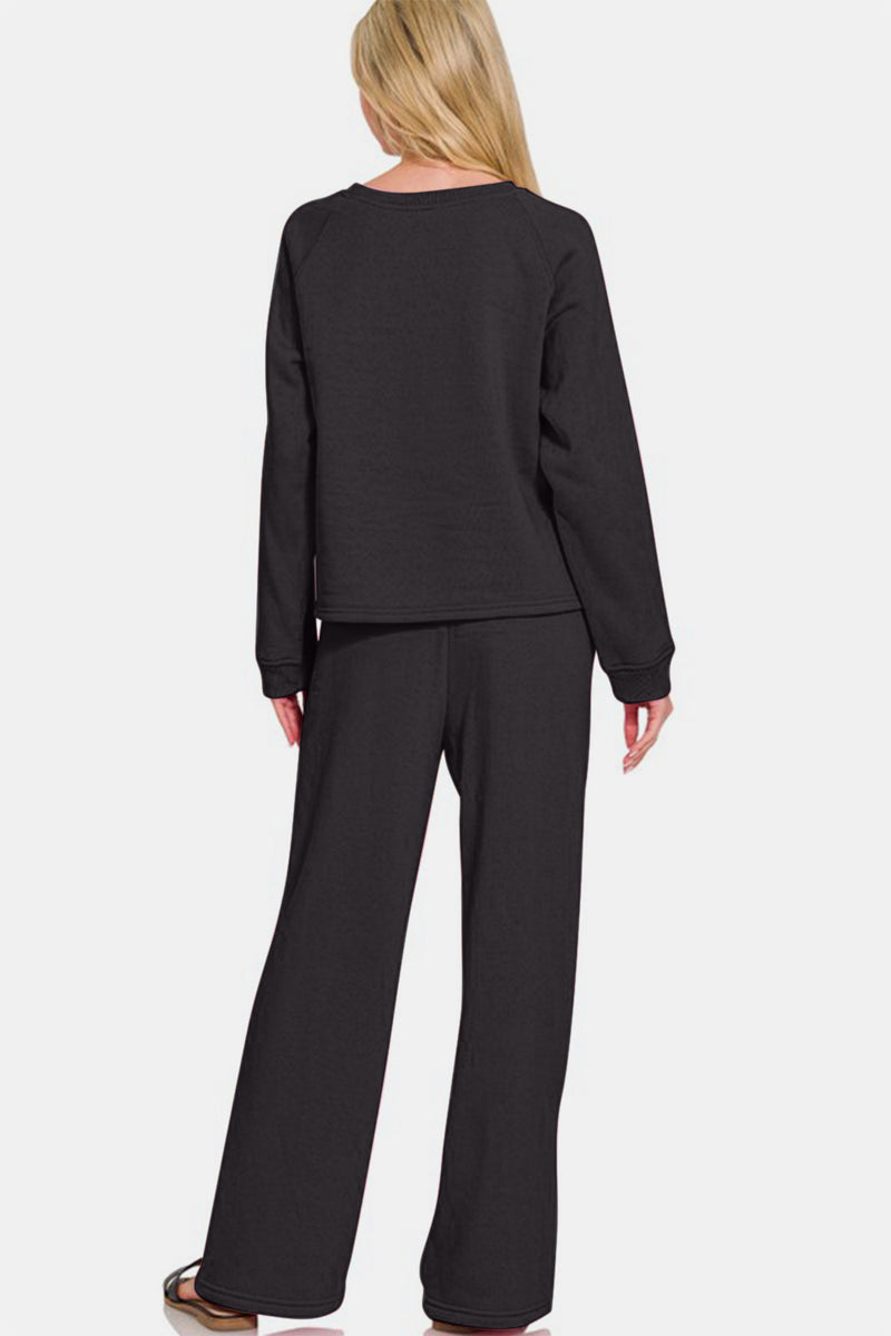 Black Fleece Raglan Sleeve Pullover & Sweatpants Lounge Set - The sweatshirt is designed with a round neckline, raglan style sleeves, and cuffs. Paired with matching black pants that feature an elastic waist, relaxed straight cut, and convenient pockets.