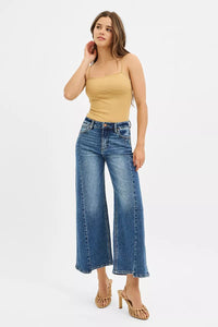 Risen High Rise Step Hem Wide Leg Jeans