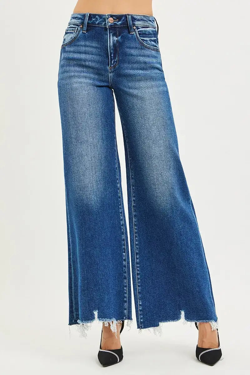 Risen High Rise Wide Leg Jeans with Distressed Hem