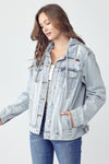 RISEN Relaxed Fit Distressed Drawstring Hooded Denim Jacket. Light acid wash denim jacket with removeable hood, a button down front, button cuffs, front button pockets, additional side pockets, and a relaxed fit.