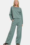 Ash Jade Fleece Raglan Sleeve Pullover & Sweatpants Lounge Set. Two-piece fleece lined including a relaxed fit pullover top and straight cut pants with pockets. 