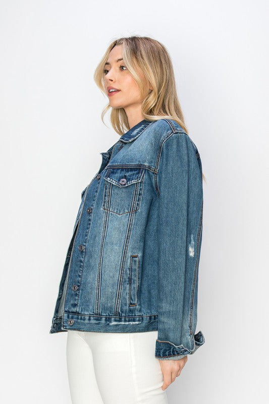 RISEN Relaxed Fit Vintage Wash Denim Jacket. Vintage wash denim jacket with a button down front, button cuffs, front button pockets, additional side pockets, and a relaxed fit. 