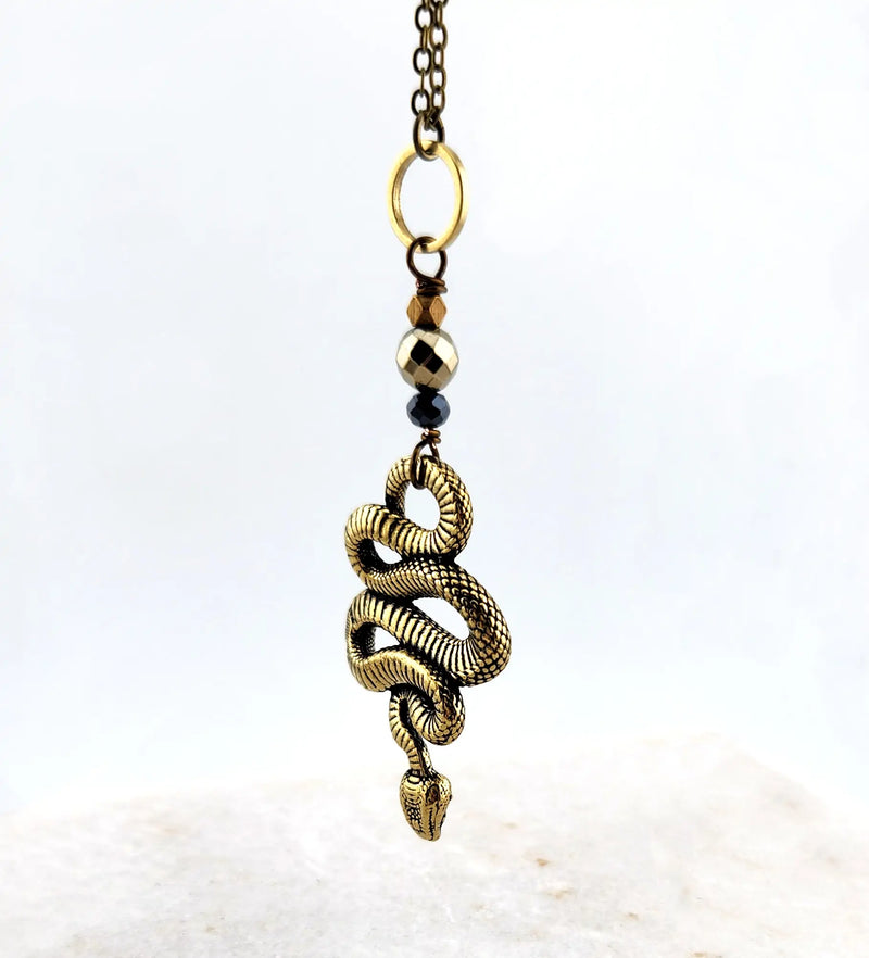 Brass Snake And Metallic Stone Long Necklace With Hematite