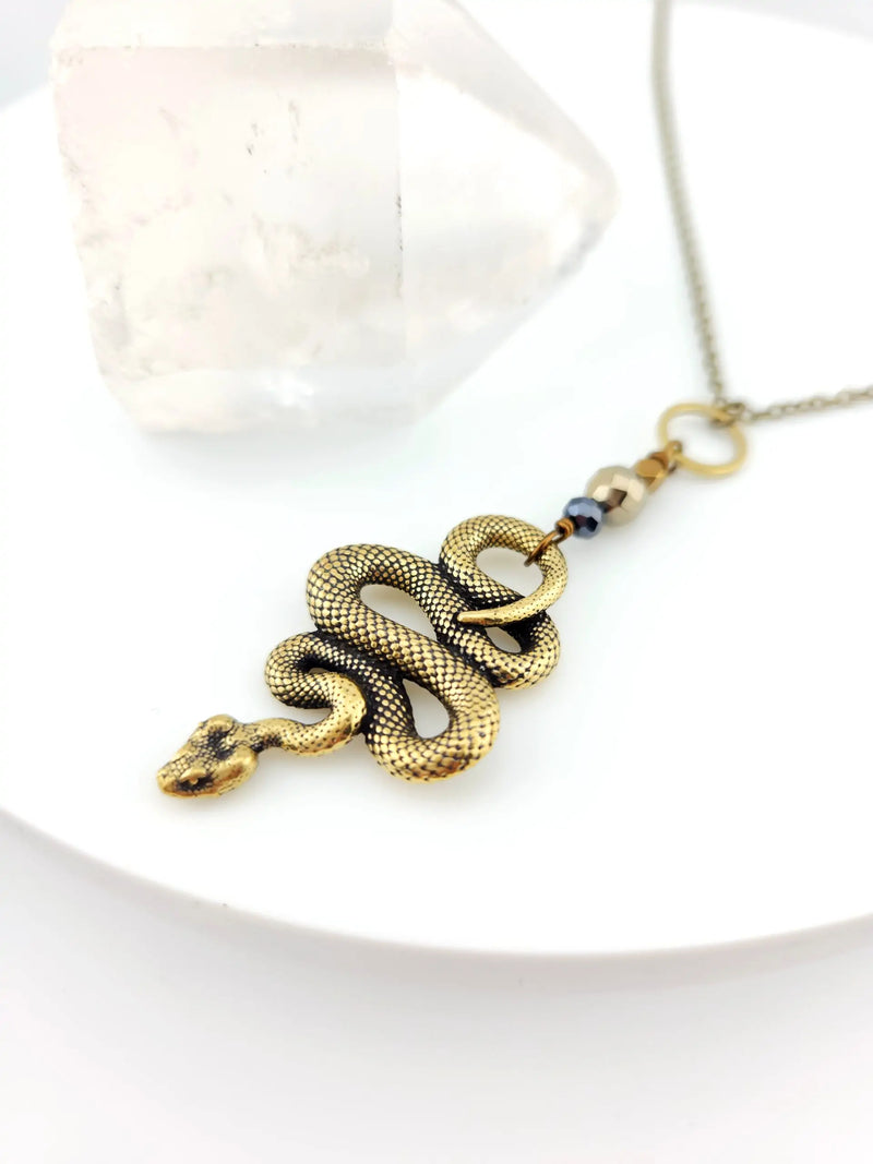 Brass Snake And Metallic Stone Long Necklace With Hematite