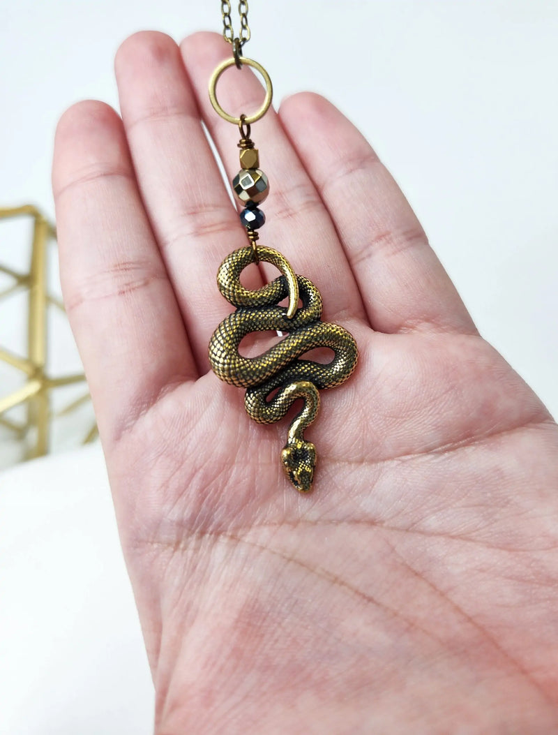 Brass Snake And Metallic Stone Long Necklace With Hematite