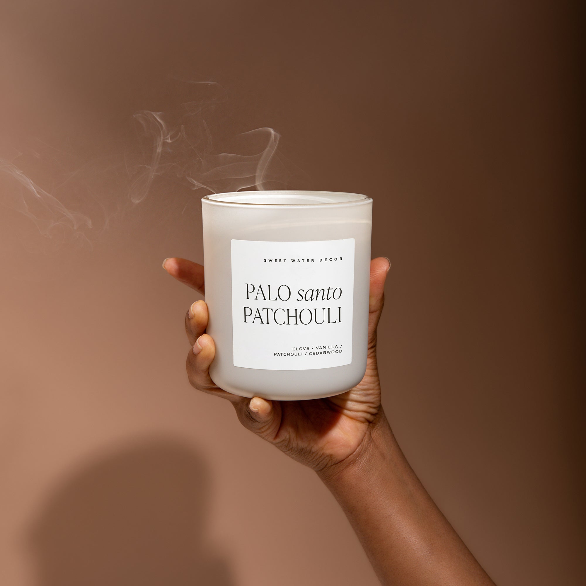 Sweet Water Decor Palo Santo Patchouli Soy Candle - Tan Matte Jar - 15 oz