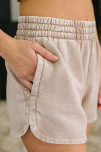Zenana Acid Wash Elastic Waistband Dolphin Hem Shorts in Ash Mocha