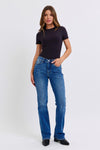 Judy Blue Mid-Rise Thermal Bootcut Jeans. These bootcut jeans feature Judy Blue stretch denim with a mid rise, medium wash, stitching on the back pockets, and no distressing.