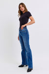 Judy Blue Mid-Rise Thermal Bootcut Jeans. These bootcut jeans feature Judy Blue stretch denim with a mid rise, medium wash, stitching on the back pockets, and no distressing.