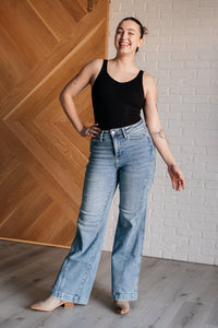 Judy Blue High Rise Side Seam Detail Wide Leg Jeans. Light wash Judy Bue stretch denim with a high rise, wide leg cut, and asymmetrical side seam detail.