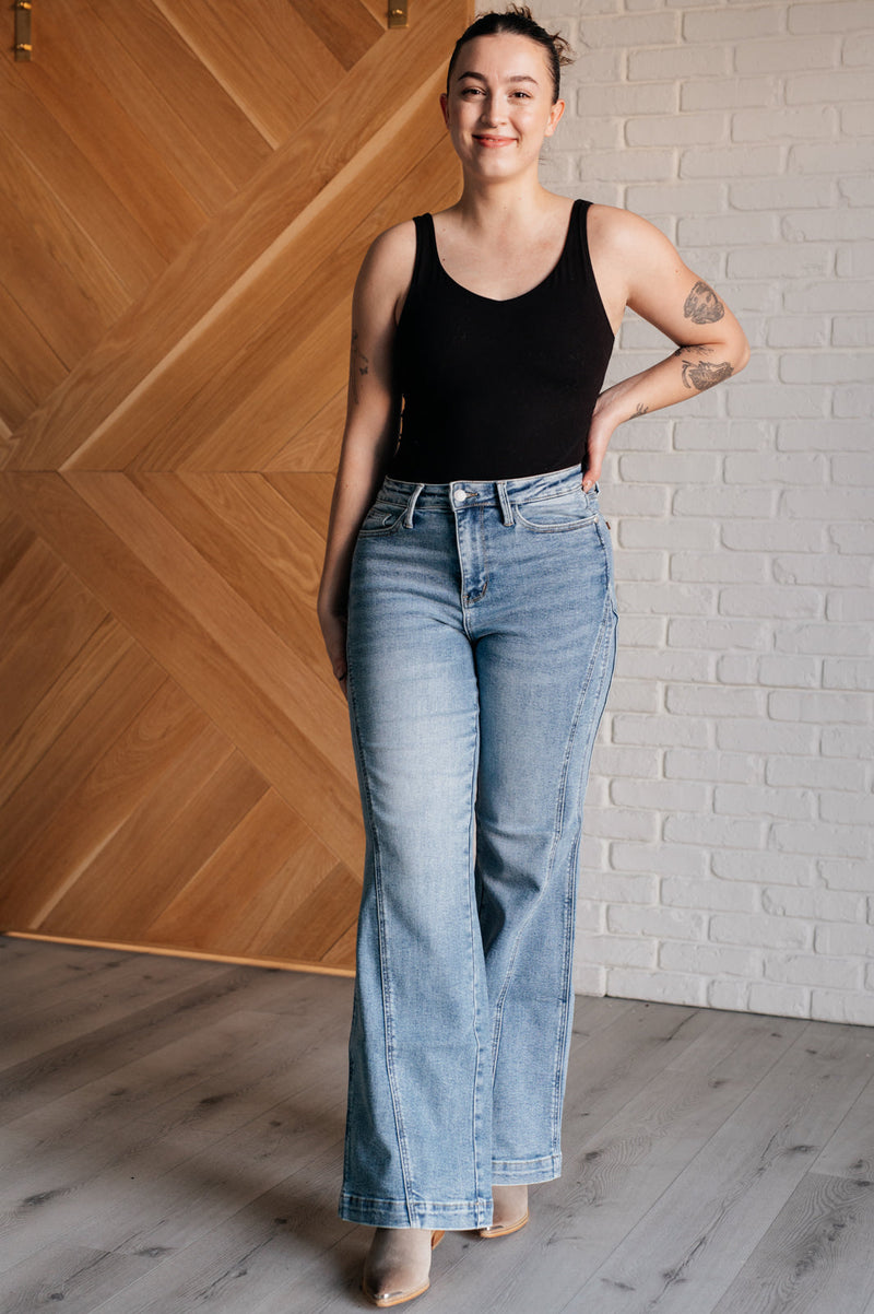 Judy Blue High Rise Side Seam Detail Wide Leg Jeans. Light wash Judy Bue stretch denim with a high rise, wide leg cut, and asymmetrical side seam detail.