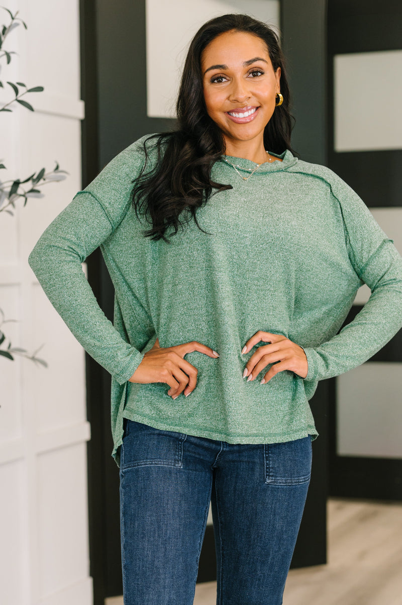 Zenana Heathered Exposed Seam Hi-Low Long Sleeve Top in Dark Green
