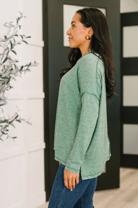 Zenana Heathered Exposed Seam Hi-Low Long Sleeve Top in Dark Green
