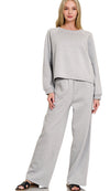 Grey Fleece Raglan Sleeve Pullover & Sweatpants Lounge Set. Two-piece fleece lined including a relaxed fit pullover top and straight cut pants with pockets. 