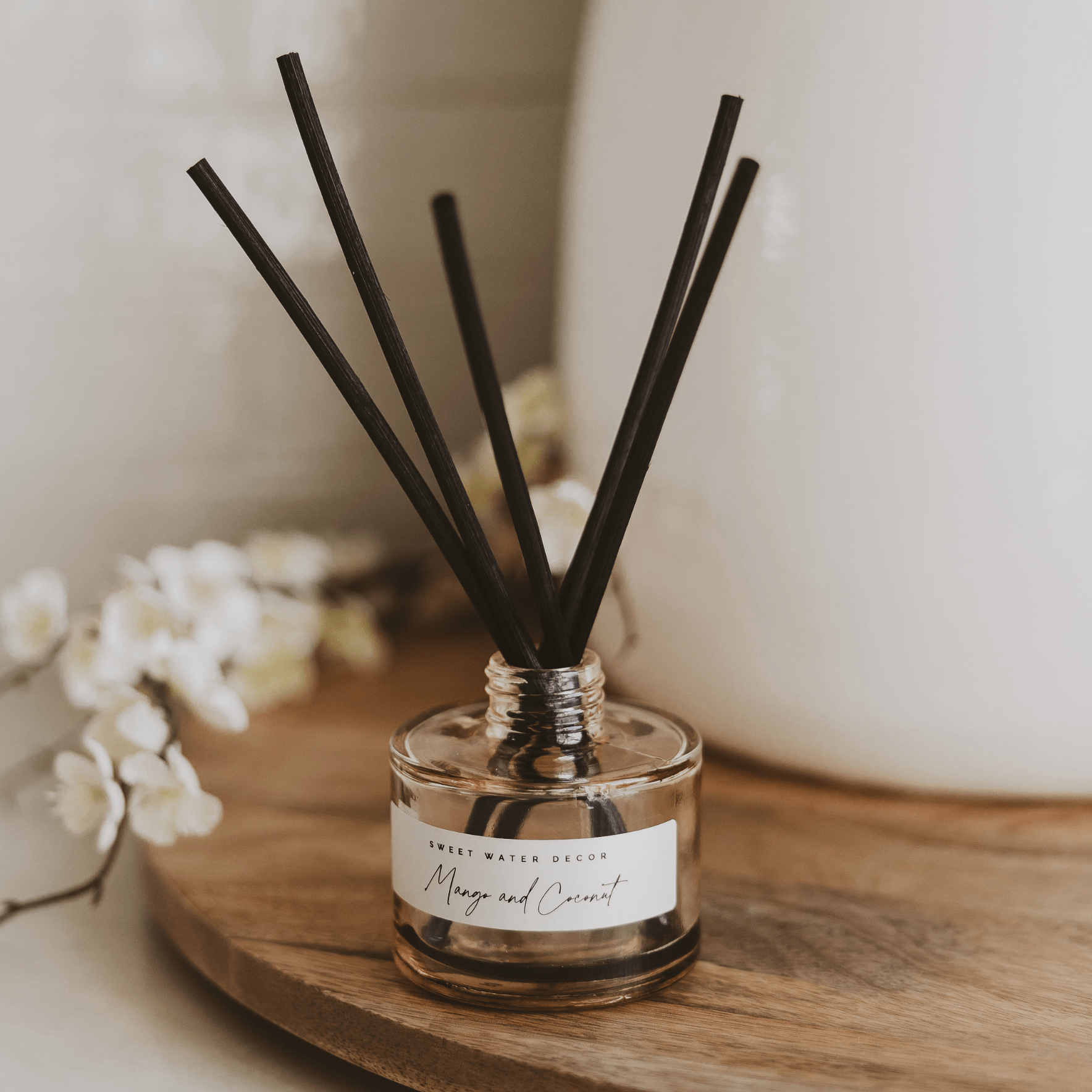 Sweet Water Decor Mango and Coconut Tinted Glass Jar Reed Diffuser