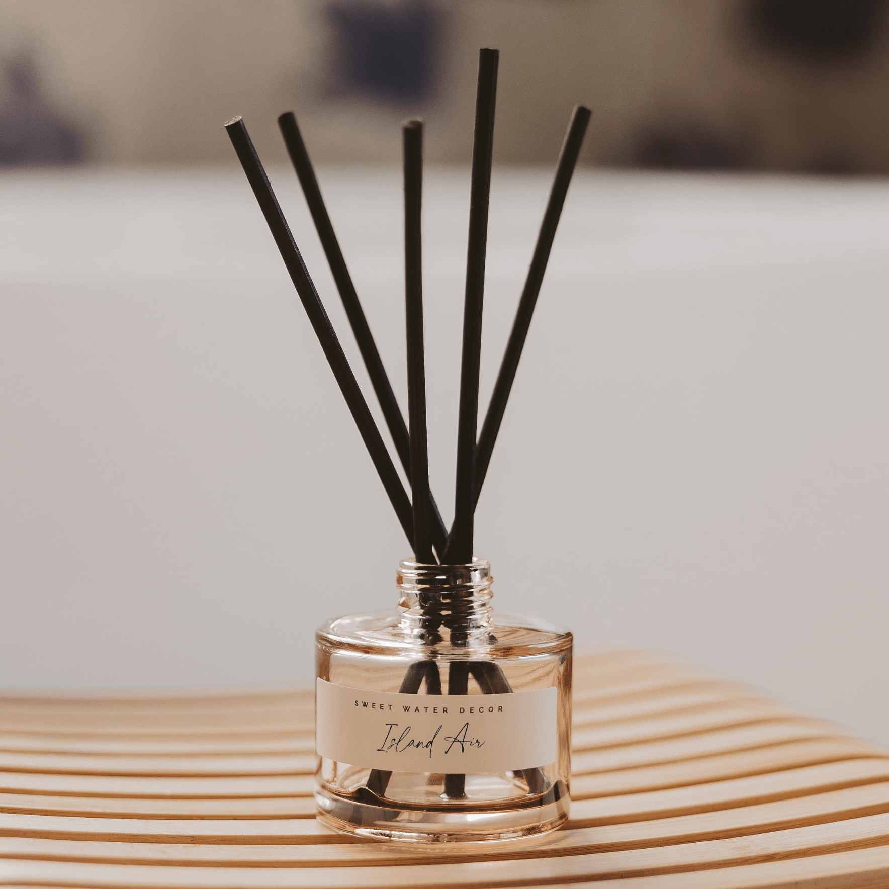 Sweet Water Decor Island Air Tinted Glass Jar Reed Diffuser