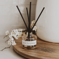 Sweet Water Decor Palo Santo Patchouli Tinted Glass Jar Reed Diffuser