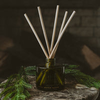 Sweet Water Decor Warm and Cozy Olive Tinted Glass Jar Reed Diffuser