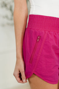 Zenana Windbreaker Smocked Waistband Running Shorts in Hot Pink