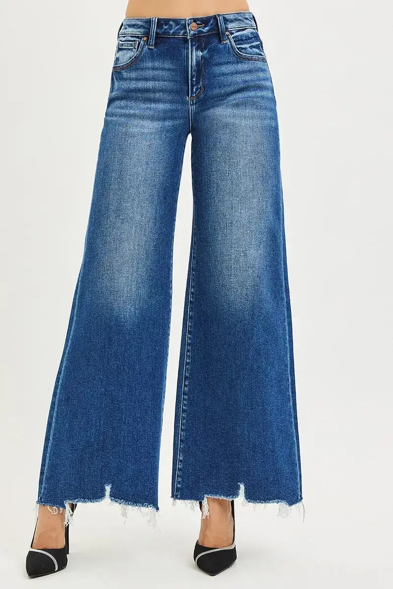 Risen High Rise Wide Leg Jeans with Distressed Hem