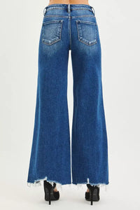 Risen High Rise Wide Leg Jeans with Distressed Hem