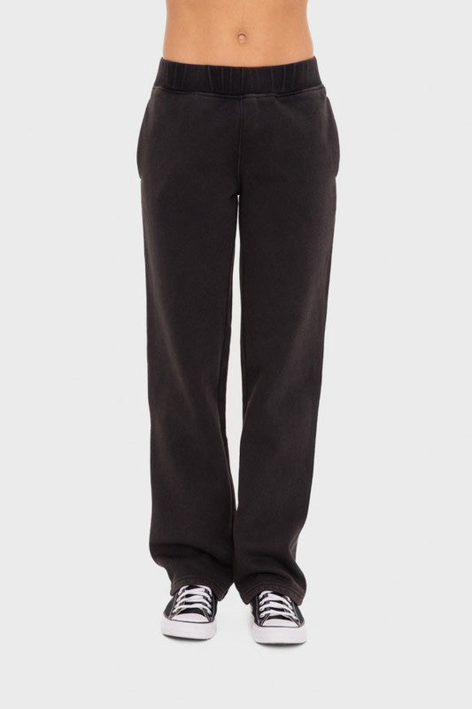 Black Mono B Elastic Waist Fleece Pants with Pockets. Black fleece sweatpants with an elastic waistband and pockets. 