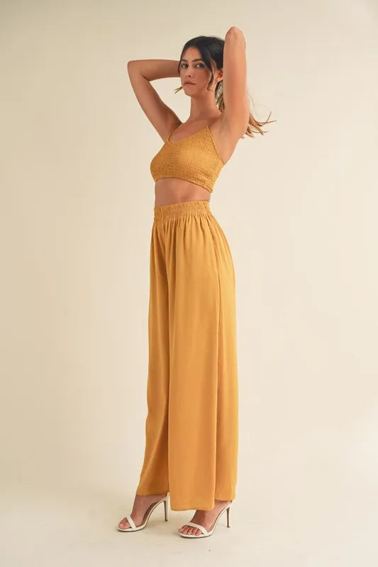 Mable Smocked Bralette Crop Top and Wide Leg Pants Set in Gold Mustard