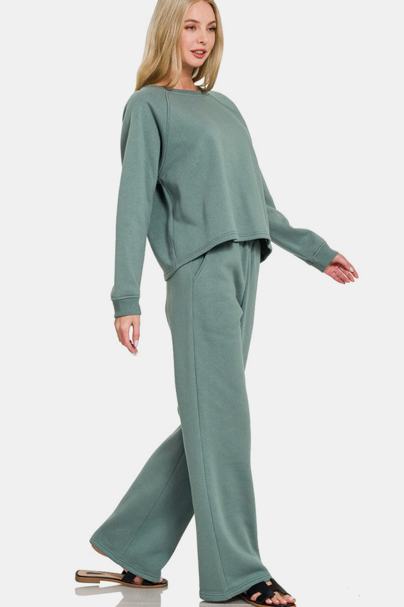 Ash Jade Fleece Raglan Sleeve Pullover & Sweatpants Lounge Set. Two-piece fleece lined including a relaxed fit pullover top and straight cut pants with pockets. 