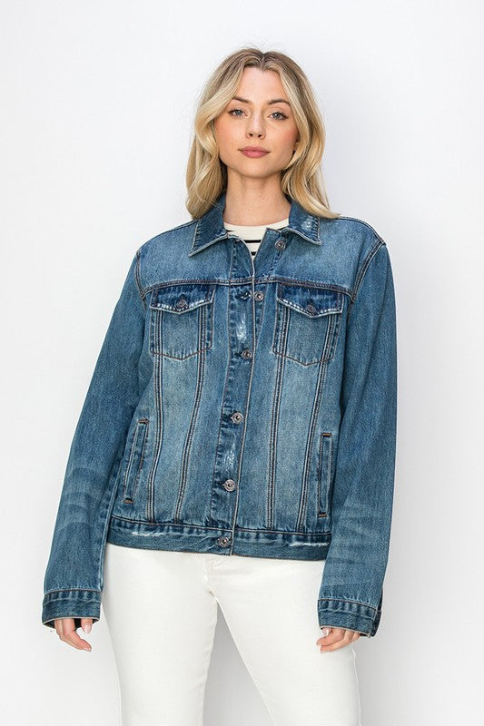 RISEN Relaxed Fit Vintage Wash Denim Jacket. Vintage wash denim jacket with a button down front, button cuffs, front button pockets, additional side pockets, and a relaxed fit. 