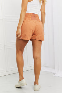 Cross Country Smocked Waist Athletic Shorts in Sherbet